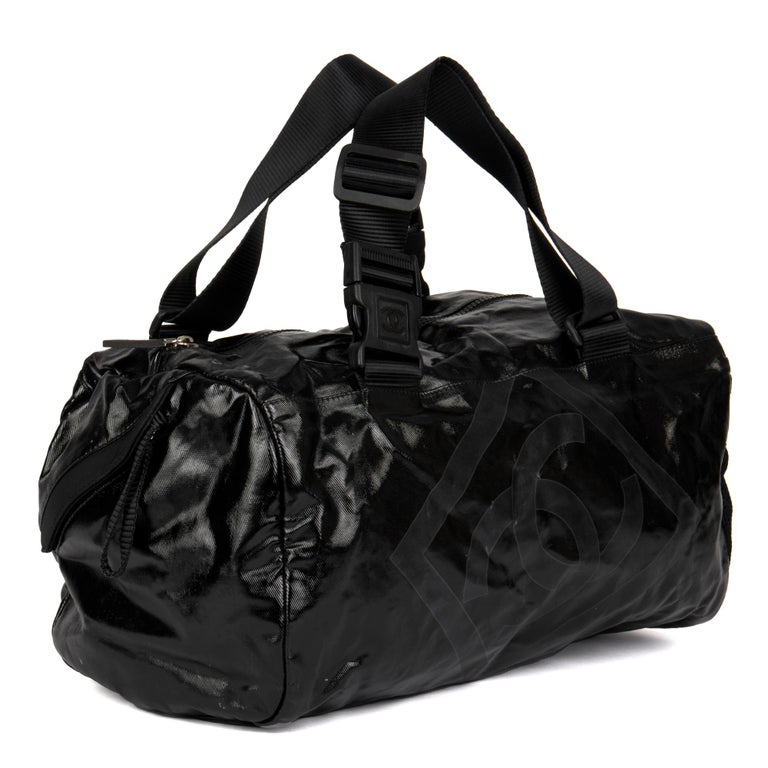 CHANEL
Black Vinyl & Mesh Sports Line Duffle Bag

Serial Number: 11545811
Age (Circa): 2007
Accompanied By: Chanel Dust Bag
Authenticity Details: Serial Sticker (Made in Italy)
Gender: Ladies
Type: Tote, Shoulder, Travel

Colour: Black
Hardware: