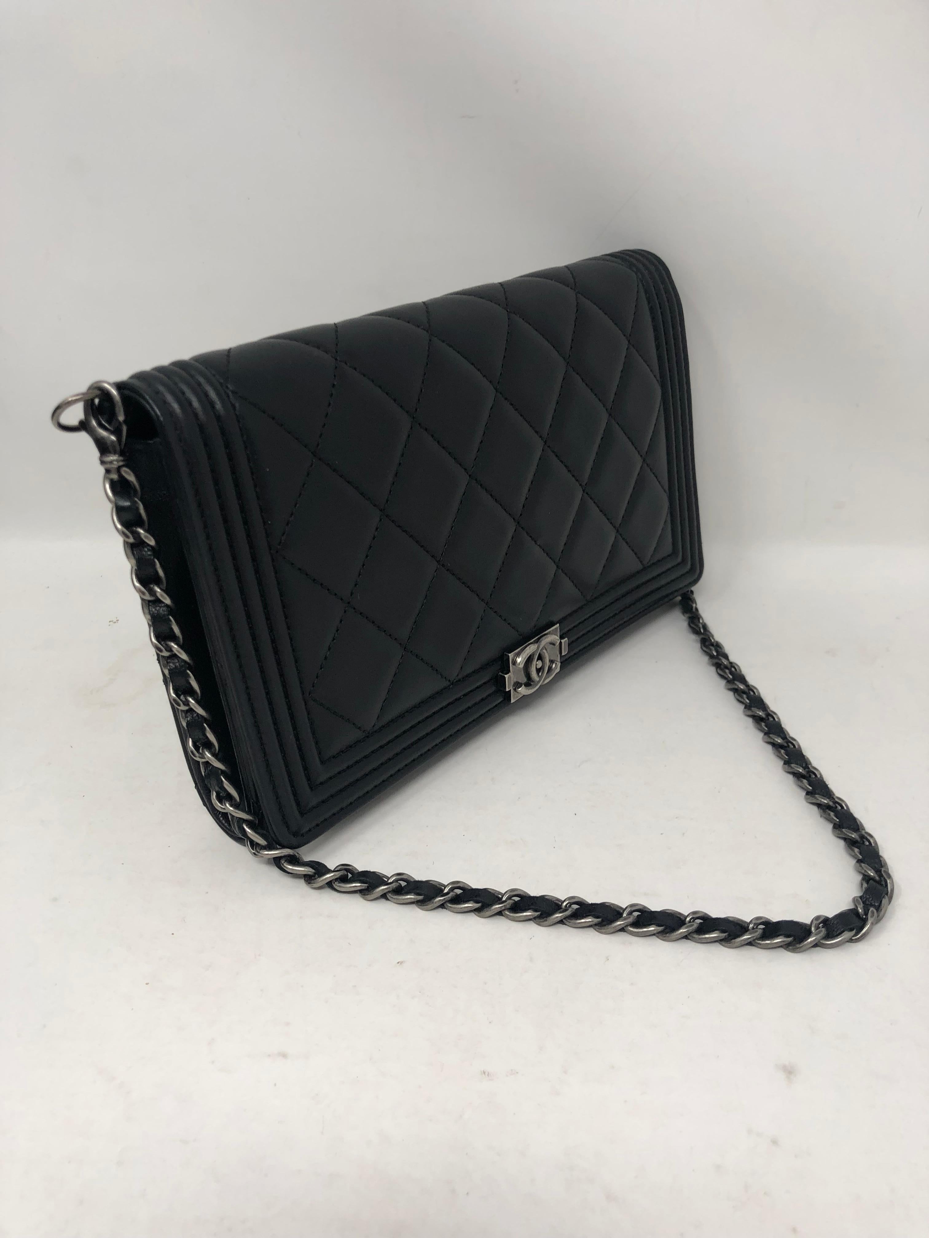 Chanel Black WOC on short chain. This is the rare and more limited WOC that was on a shorter chain not the longer chain. This bag can be worn as a clutch or a shoulder bag. Can also be worn as a wristlet. Hard to find style that also came with a