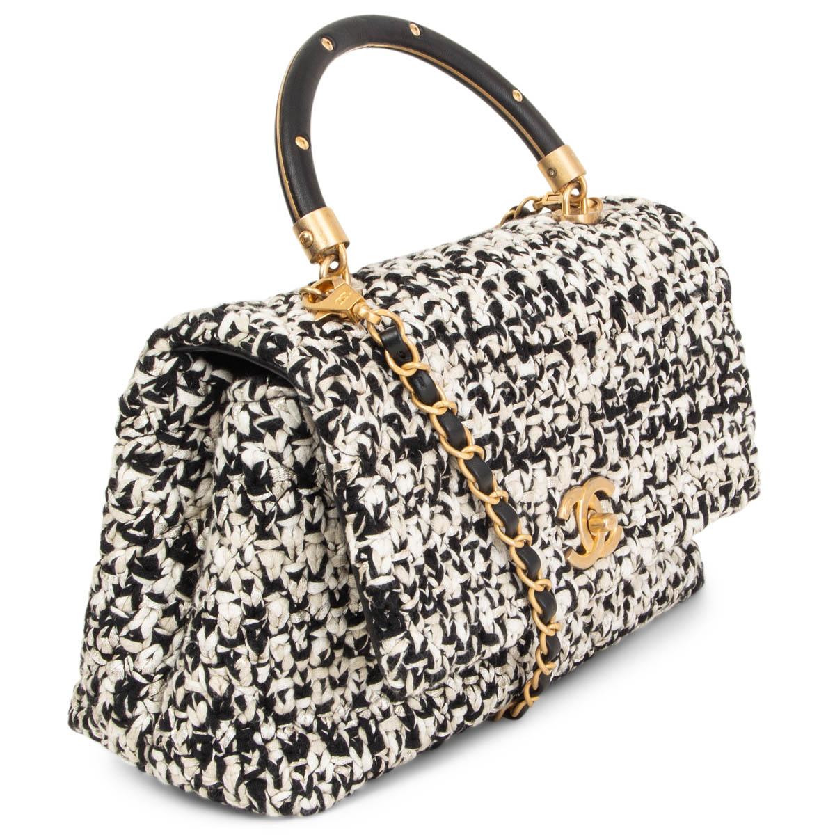 100% authentic Chanel 2018 Small Coco Top Handle Bag in light grey, white and black crochet tweed featuring black calfskin bottom, handle and detachable shoulder-strap. Opens with a gold-tone CC turn-lock and is lined in sand canvas with one zipper