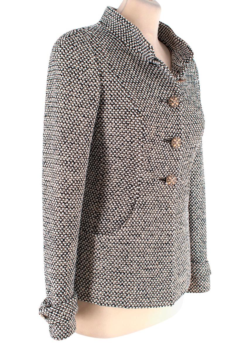 Chanel Black & White Boucle Jacket with Stand Collar
 

 - Elegant slim silhouette jacket crafted from a bobbly black & white boucle with simple stand collar, and Byzantine style button in gold-tone metal, with faux gems
 - Scooped inset hip