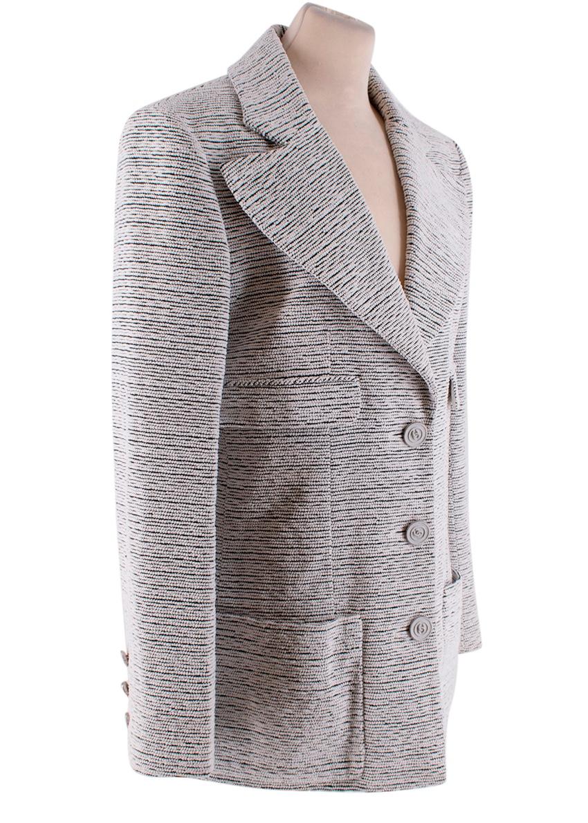Chanel Black & White Boucle Textured Blazer Jacket

-Made of a soft velvet like fabric
-Beautiful boucle texture
-Gorgeous black and white pattern 
-Classic single breasted cut
-Branded cc glitter coated metal buttons 
-Luxurious silk lining,
