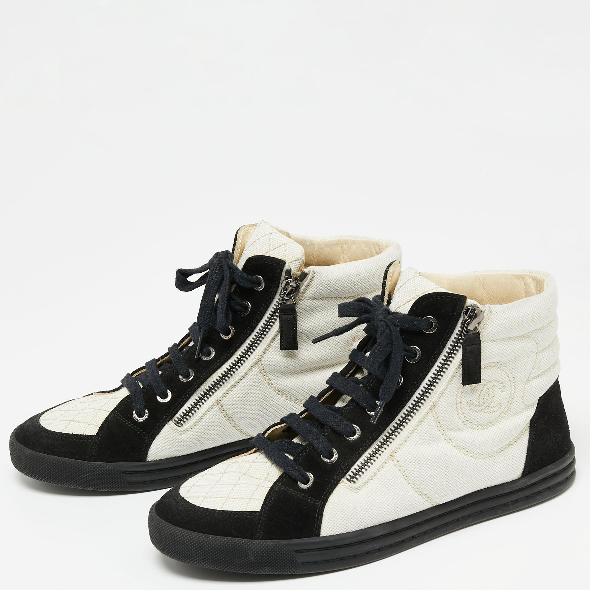 Designed into a high-top silhouette, these Chanel sneakers are not just stylish in appeal but also comfortable to wear. Crafted from quality materials, they are designed with CC logos on the sides. Finished off with laces on the vamps, these shoes