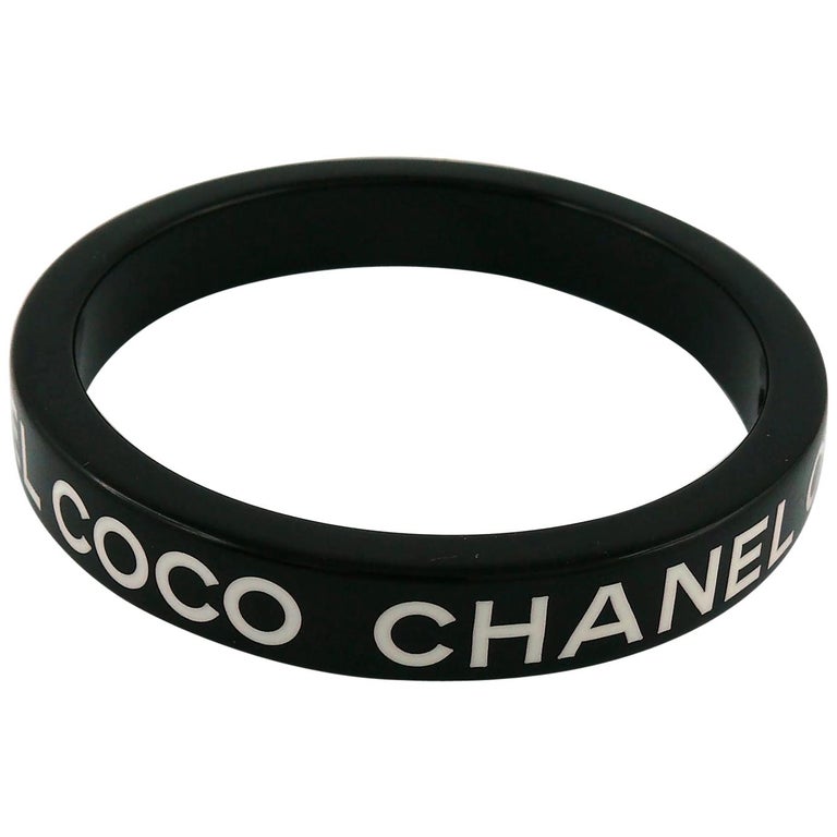 Chanel Black and White Coco Chanel Bangle Bracelet at 1stDibs | chanel  black bracelet, chanel bracelet black, coco head bracelet