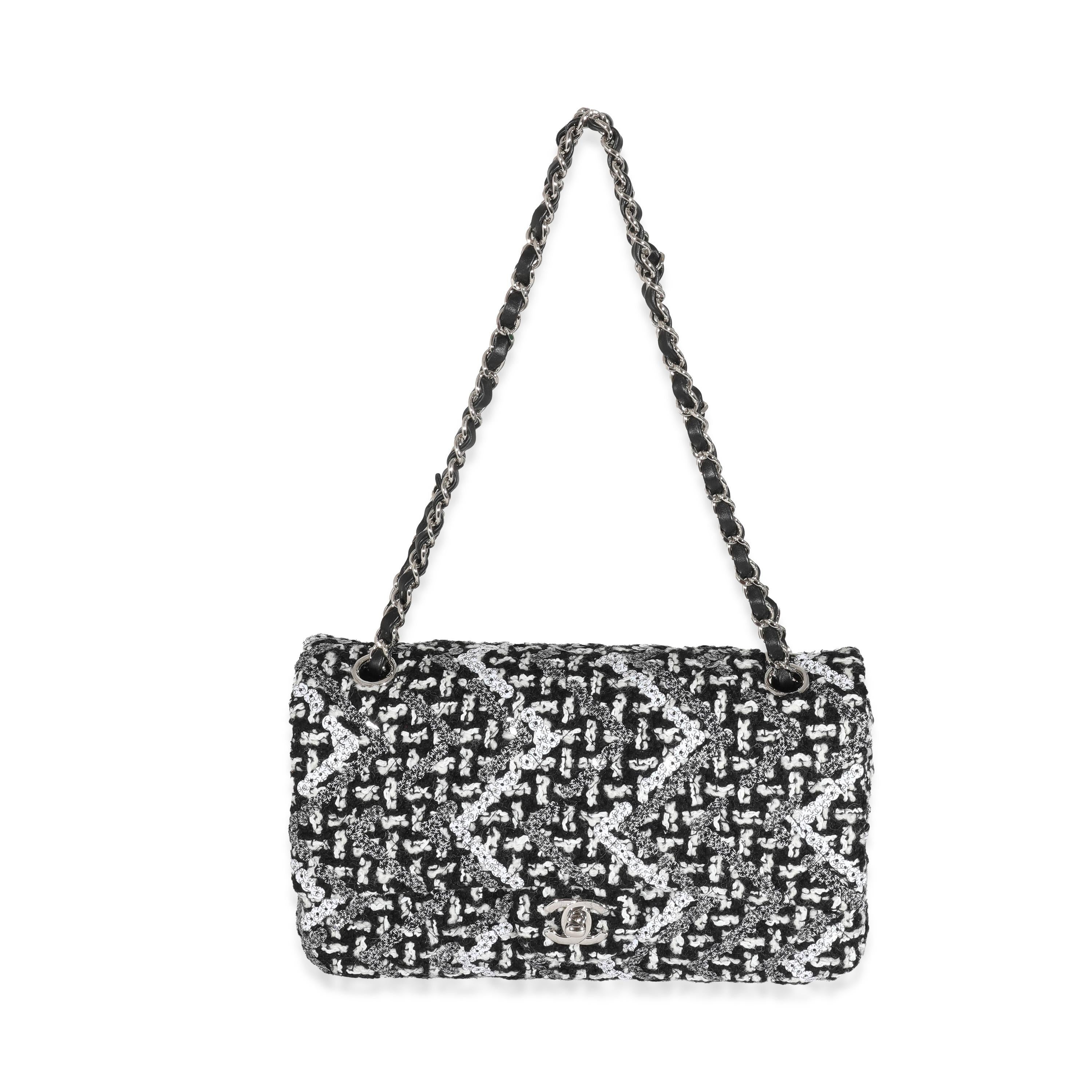 Listing Title: Chanel Black & White Crochet & Sequin Medium Double Flap
SKU: 131493
Condition: Pre-owned 
Condition Description: A timeless classic that never goes out of style, the flap bag from Chanel dates back to 1955 and has seen a number of