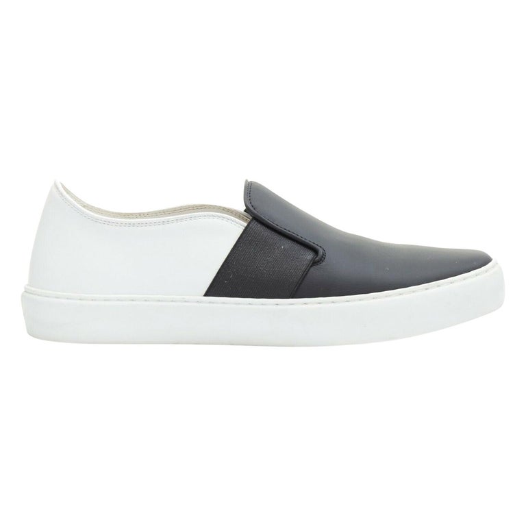 CHANEL black leather bicolor CC casual slip on sneakers EU37.5 For Sale at 1stDibs | chanel slip on sneakers
