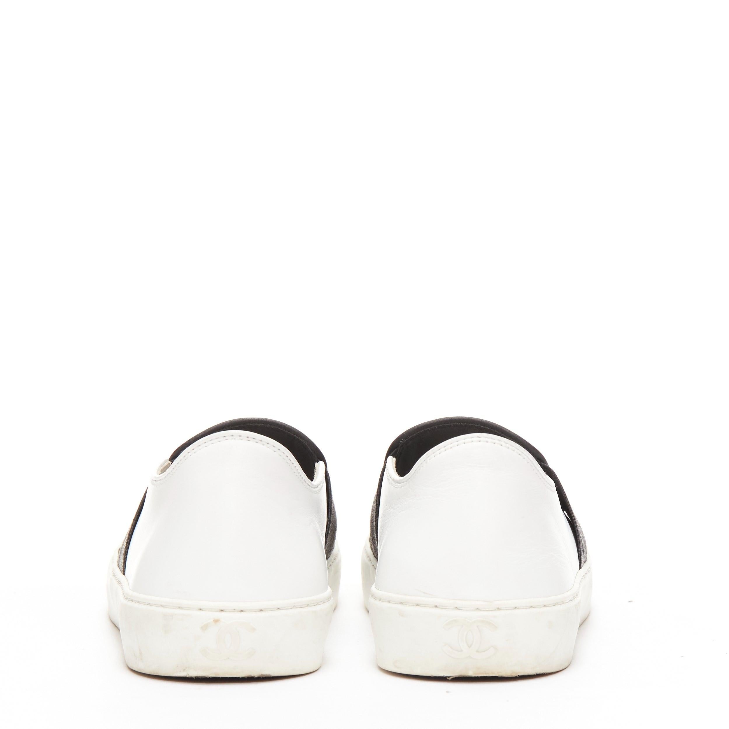 Women's CHANEL black white leather CC logo back minimal classic skates sneakers EU36 For Sale