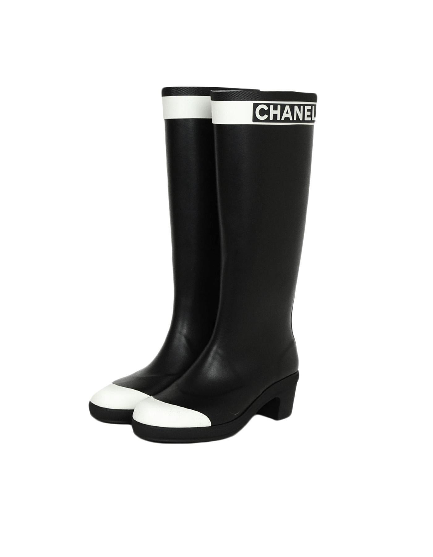 Chanel Black/White Rubber Rain Boots sz 38

Made In: France
Color: Black, White
Materials: Rubber
Closure/Opening: Slip on
Overall Condition: Excellent pre-owned condition, with the exception of scuffs on the exterior 
Includes: Box, Two