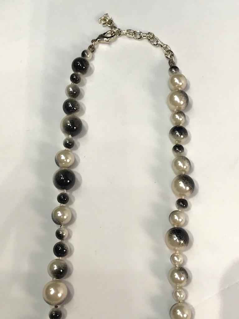 chanel black and white necklace