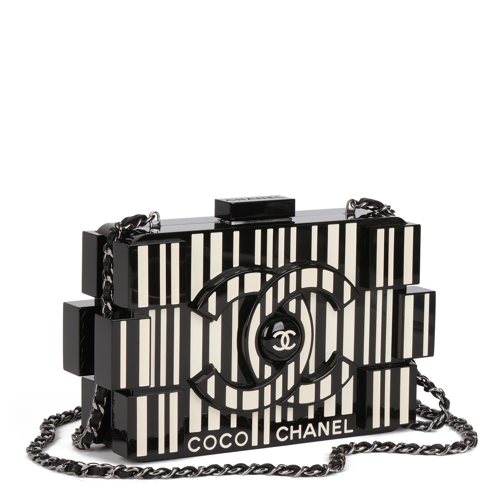 CHANEL
Black & White Plexiglass Barcode Lego Minaudière Clutch

Xupes Reference: CB576
Serial Number: 20564428
Age (Circa): 2015
Accompanied By: Chanel Dust Bag, Box, Authenticity Card
Authenticity Details: Authenticity Card, Serial Sticker (Made in