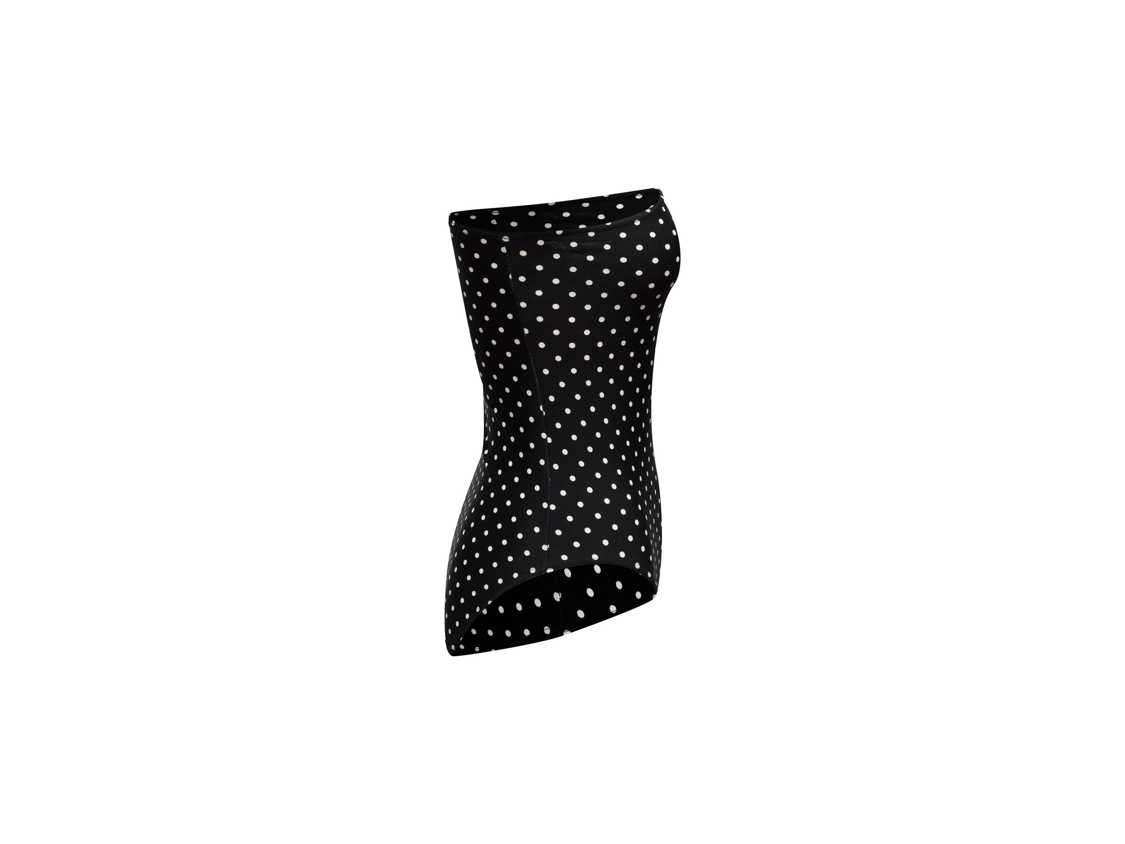Product details: Vintage black and white one-piece swimsuit by Chanel. Polka dot print throughout. Single strap. Designer size 40. 23