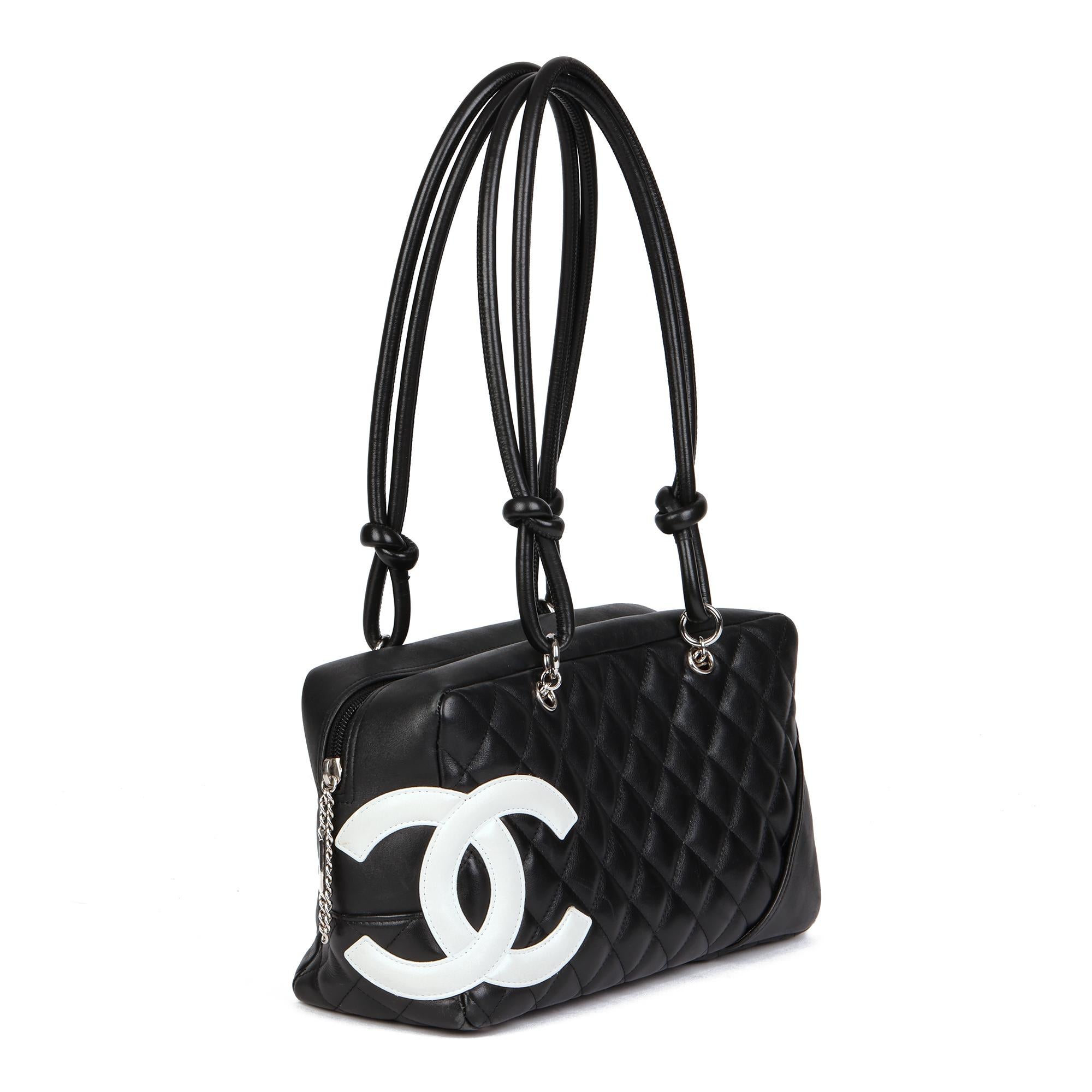 CHANEL
Black & White Quilted Lambskin Large Cambon Bowler

Xupes Reference: CB666
Serial Number: 9523876
Age (Circa): 2005
Authenticity Details: Serial Sticker (Made in France)
Gender: Ladies
Type: Tote, Shoulder

Colour: Black
Hardware: