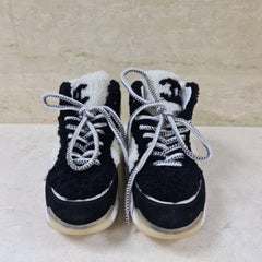 Chanel Black White Shearling Suede CC High Top Sneakers
