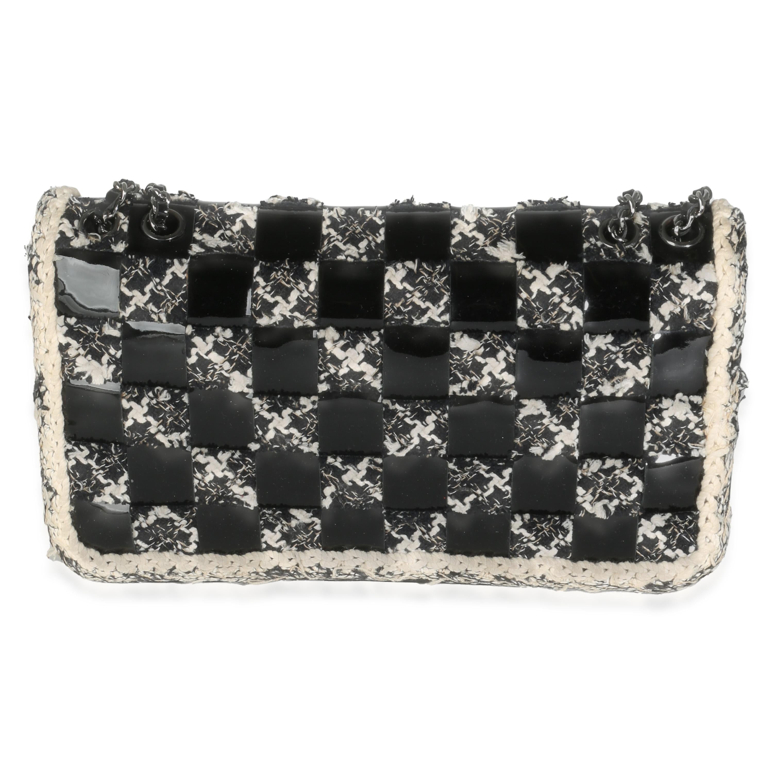 Listing Title: Chanel Black White Tweed Woven Patent Medium Flap Bag
SKU: 142304
Condition: Pre-owned 
Condition Description: A timeless classic that never goes out of style, the flap bag from Chanel dates back to 1955 and has seen a number of