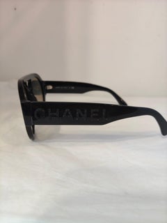 Chanel black with swarovski stones sunglasses still with folder