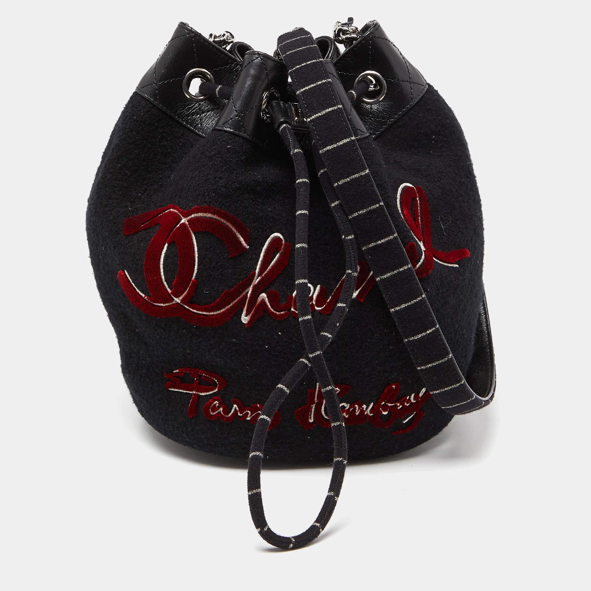 Indulge in luxury with this Chanel drawstring bag. Meticulously crafted from premium materials, it combines exquisite design, impeccable craftsmanship, and timeless elegance. Elevate your style with this fashion accessory.

