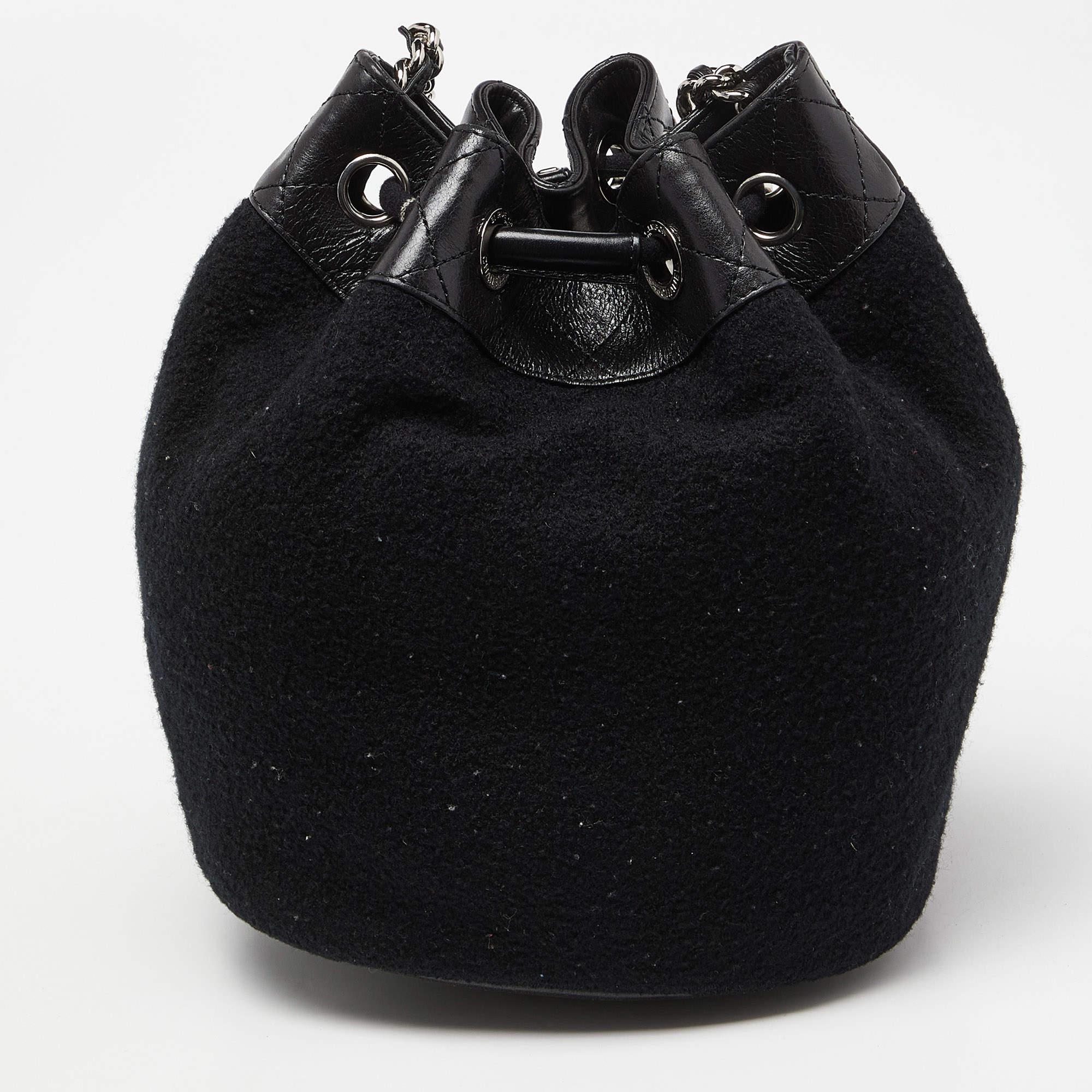Indulge in luxury with this Chanel drawstring bag. Meticulously crafted from premium materials, it combines exquisite design, impeccable craftsmanship, and timeless elegance. Elevate your style with this fashion accessory.

Includes: Authenticity