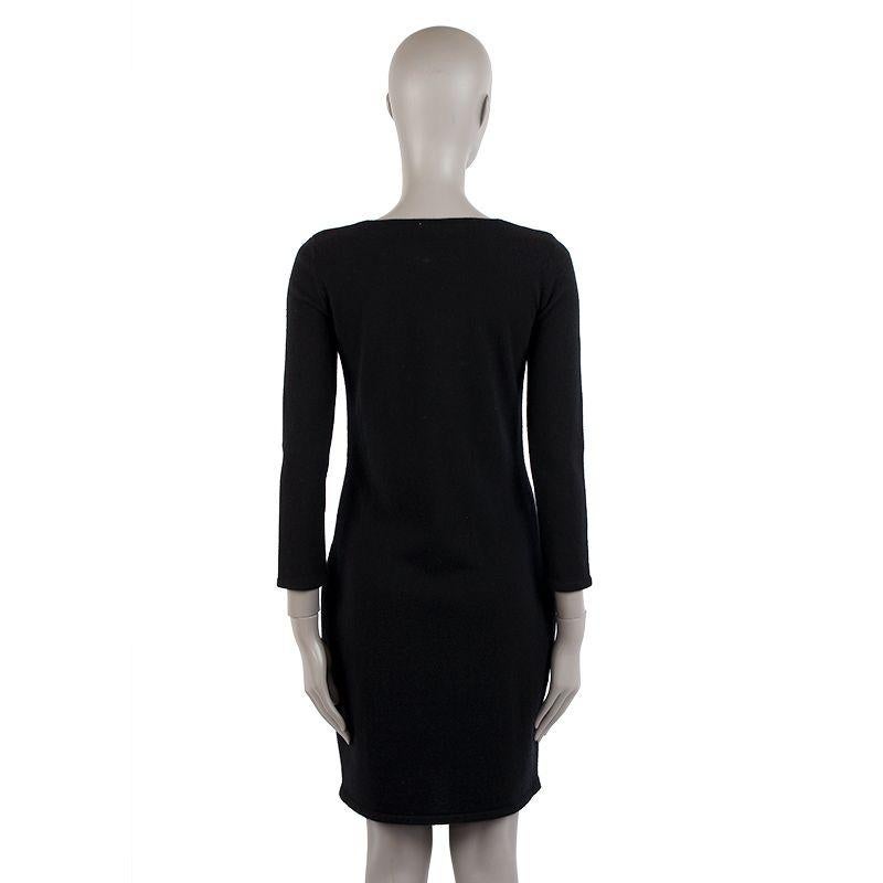 Chanel casual dress in black wool (80%) and cashmere (20%) with two quilted leather pockets on the front. Unlined. Has been worn and is in excellent condition.

Tag Size 36
Size XS
Shoulder Width 37cm (14.4in)
Bust 80cm (31.2in) to 90cm (35.1in)