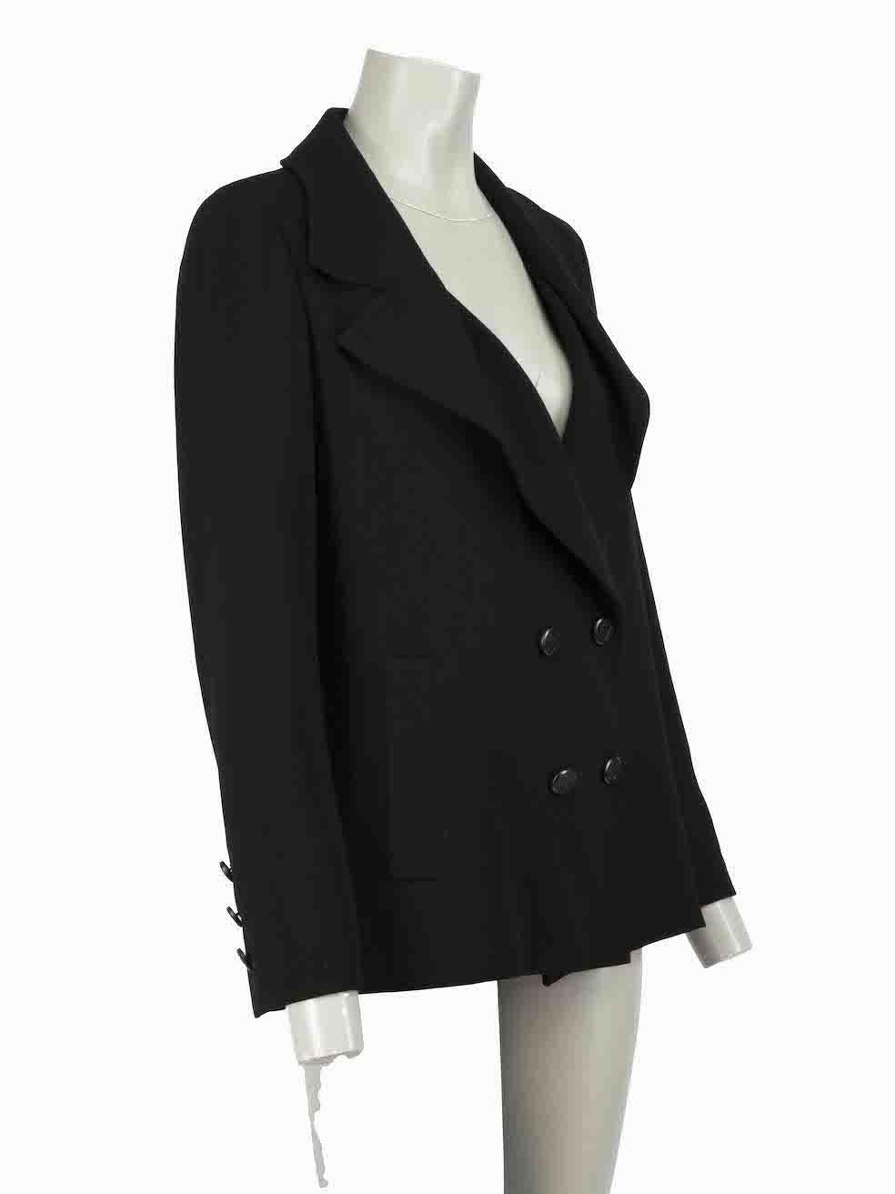 CONDITION is Very good. Hardly any visible wear to blazer is evident on this used Chanel designer resale item.

Details
Black
Wool
Oversized blazer
Double breasted
CC logo buttons
Buttoned cuffs
2x Front side pockets
Shoulder padded

Made in