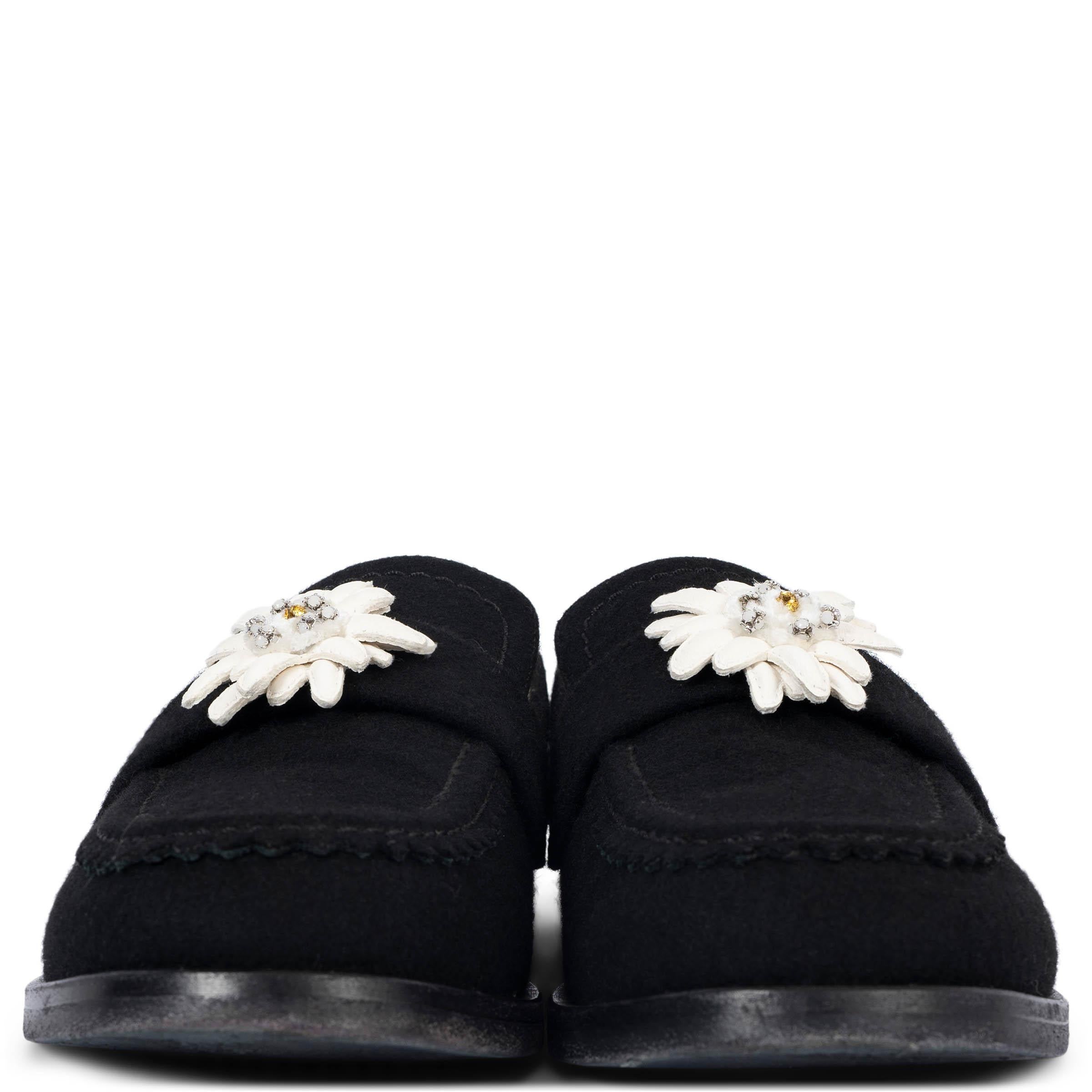 100% authentic Chanel Edelweiss penny loafers in black wool felt embellished with white lambskin Edelweiss flower. Have been worn and are in excellent condition. 

2015 Paris-Salzburg Metiers d'Art

Measurements
Model	15A G31006
Imprinted