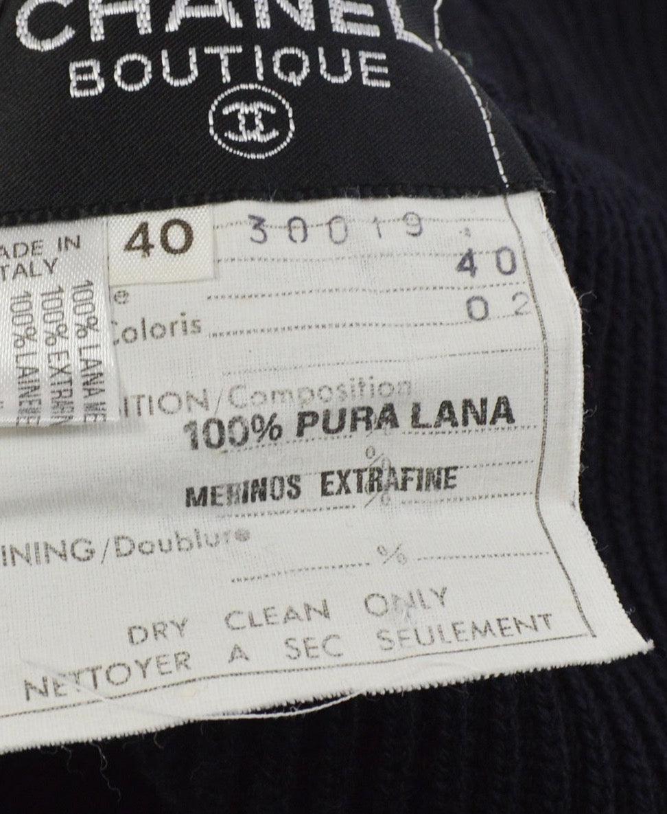 CHANEL Suéter largo de lana negro con detalle de trébol dorado 2 en 1 - Talla FR 40 en venta 1