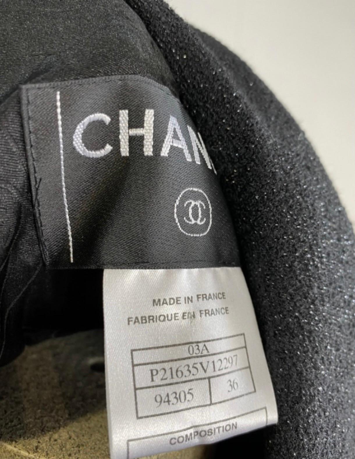 Chanel Anzug aus schwarzer Wolle mit Jacke und Rock Damen im Angebot