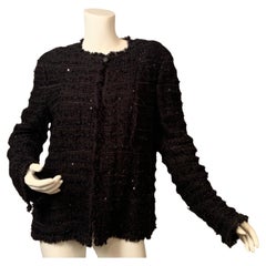 Giacca Chanel in lana nera con paillettes e nastri neri