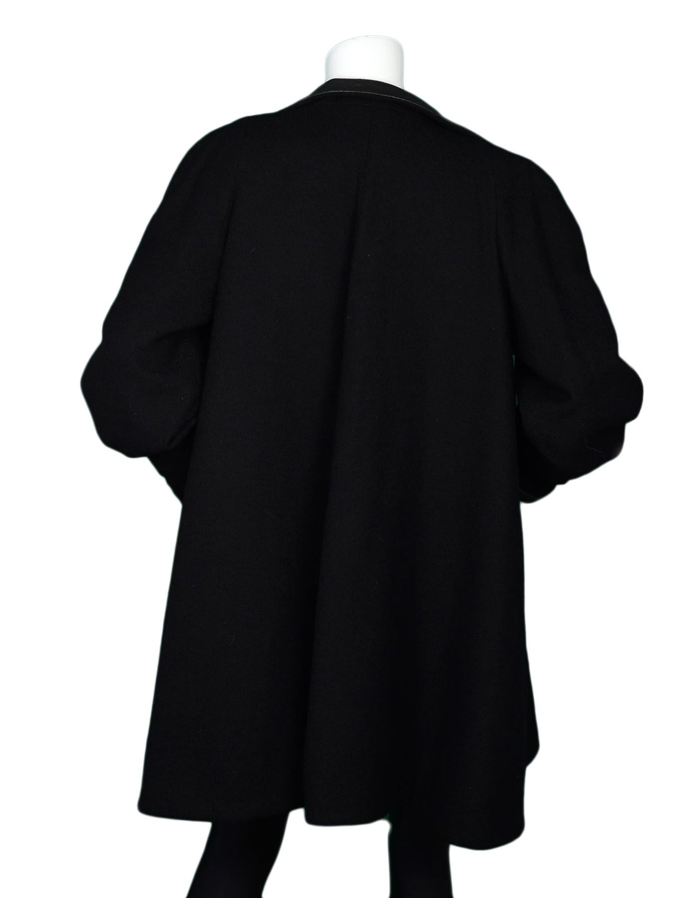 black wool coat with leather trim