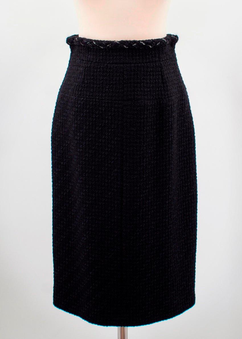 Chanel Black Wool Tweed Pencil Skirt 

-Fitted silhouette
-Chanel classic tweed 
-Mid-length
-High-waisted
-Concealed back zip fastening
-Back button placket
- 100% Wool, 86% Silk & 14% Elastane lining 

Please note, these items are pre-owned and