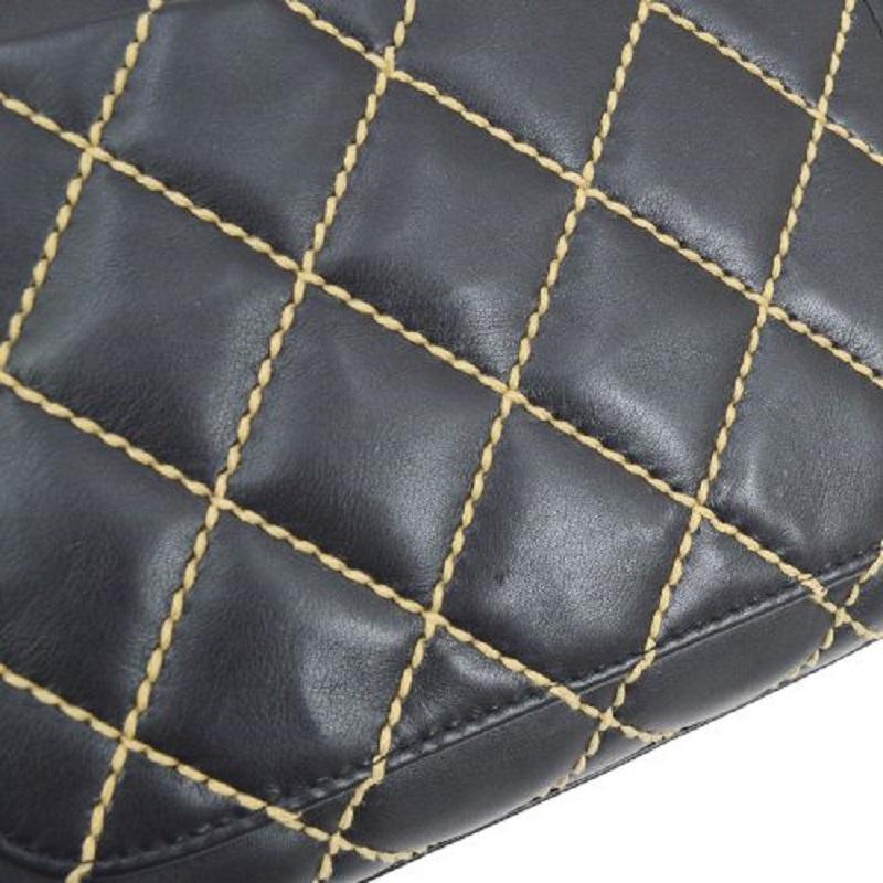 Noir CHANEL Sac à rabat de soirée Kelly à poignée supérieure en cuir d'agneau noir et jaune avec points dorés en vente