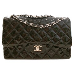 Chanel BLK PATENT DOUBLE FLAP JUMBO -EXCELLANT