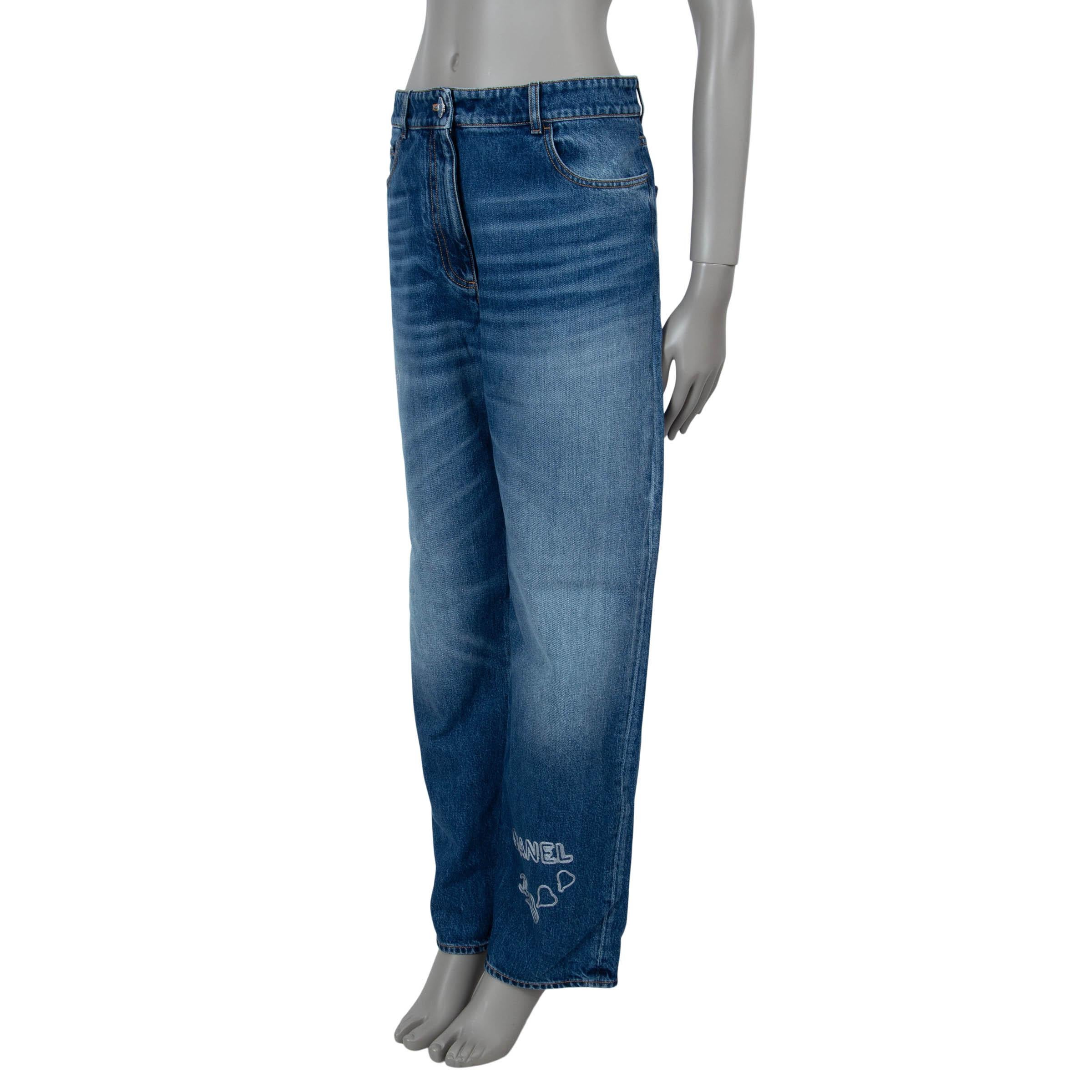 These 100% authentic Chanel jeans in blue washed denim cotton (100%) showcase playful sophistication with multiple white logo and heart embroideries throughout. Designed with a high waist and straight leg, they feature a classic five-pocket design.