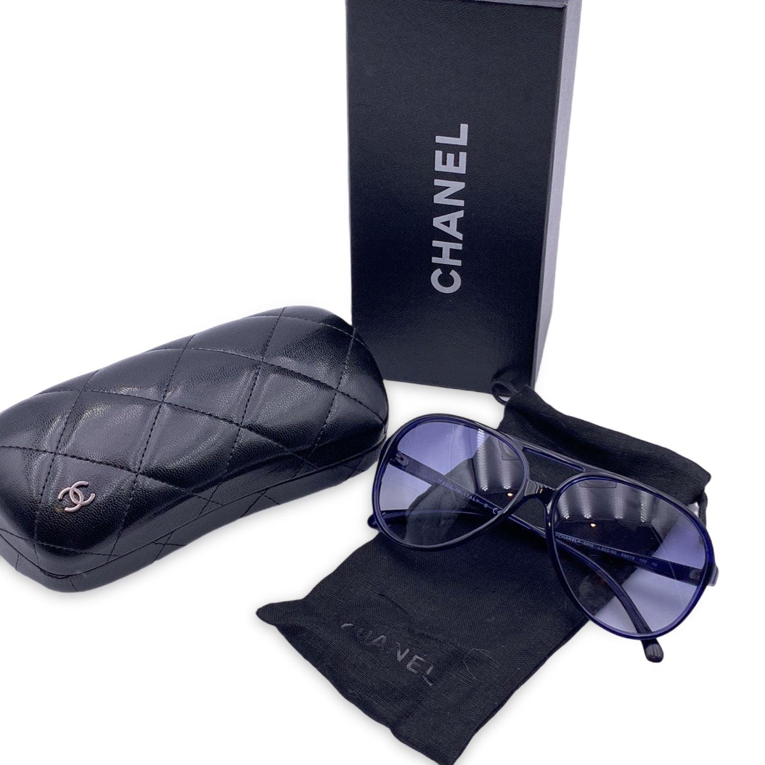 Blue acetate Aviator sunglasses by Chanel. Model: 5206 - c.503/9S. 100% Total UVA/UVB protection gradient blue lenses. Made in Italy Details MATERIAL: Plastic COLOR: Blue MODEL: 5206 GENDER: Unisex Adults COUNTRY OF MANUFACTURE: Italy ORIGINAL