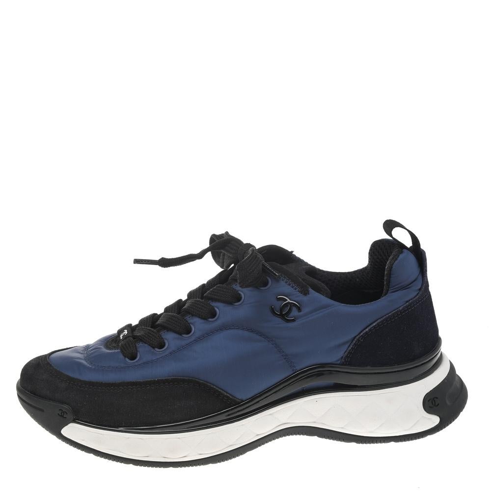 Nothing can make you look more dapper and stylish than a good pair of sneakers. These sneakers from the House of Chanel will amaze you with their sturdy silhouette and classy aesthetic. They are made from black-blue neoprene and suede into a low-top