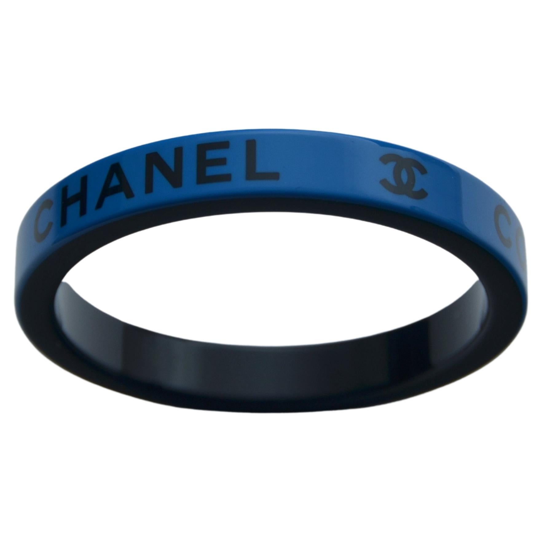 100% authentic guaranteed 
Chanel Blue/Black resin bracelet
New with tags.
One size fit all
FINAL SALE