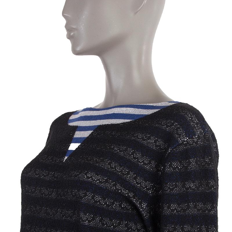 Chanel striped and flower-knit sweater in black, blue, and white cotton (49%), rayon (26%), and silk (25%). With 3/4 sleeves, folded cuffs. and wide neck. Has been worn and is in excellent condition. 

Tag Size 34
Size XXS
Shoulder Width 46cm