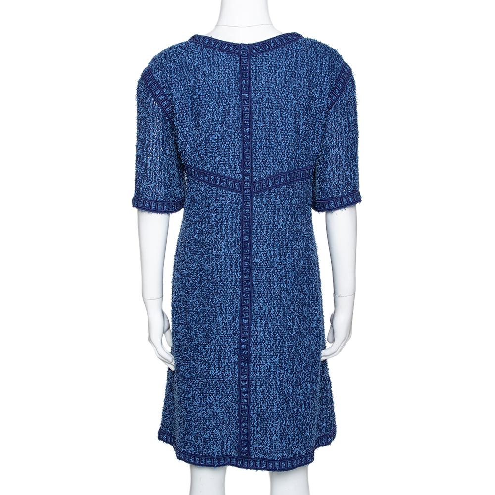 Chanel creations are coveted around the world for their exquisite quality and timeless designs. Their Boucle creations are every fashionista's c=dream and this shift dress confirms it. Crafted from quality tweed, it comes in a lovely shade of blue.