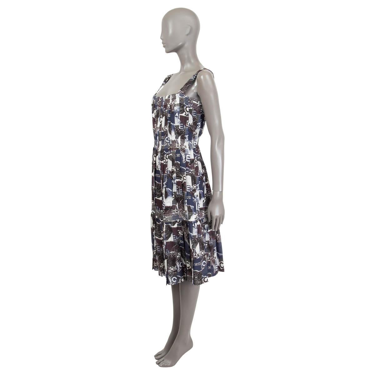 100% authentic Chanel 2020 sleeveless pleated dress in pale navy, pale brown, white, black and pale olive green logo and Camellia printed silk (100%). Opens with 7 hidden buttons on the back. Has been worn once and isn in virtually new condition.