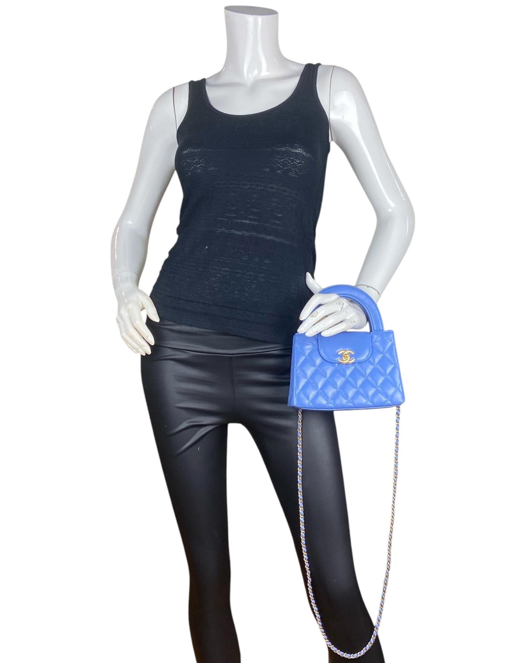 Chanel Blue Calfskin Leather Quilted Nano Kelly Shopper Bag

Made In: Italy
Year of Production: 2025
Color: Blue
Hardware: Goldtone
Materials: Aged shiny calfskin leather, metal
Lining: Leather
Closure/Opening: Center flap with CC