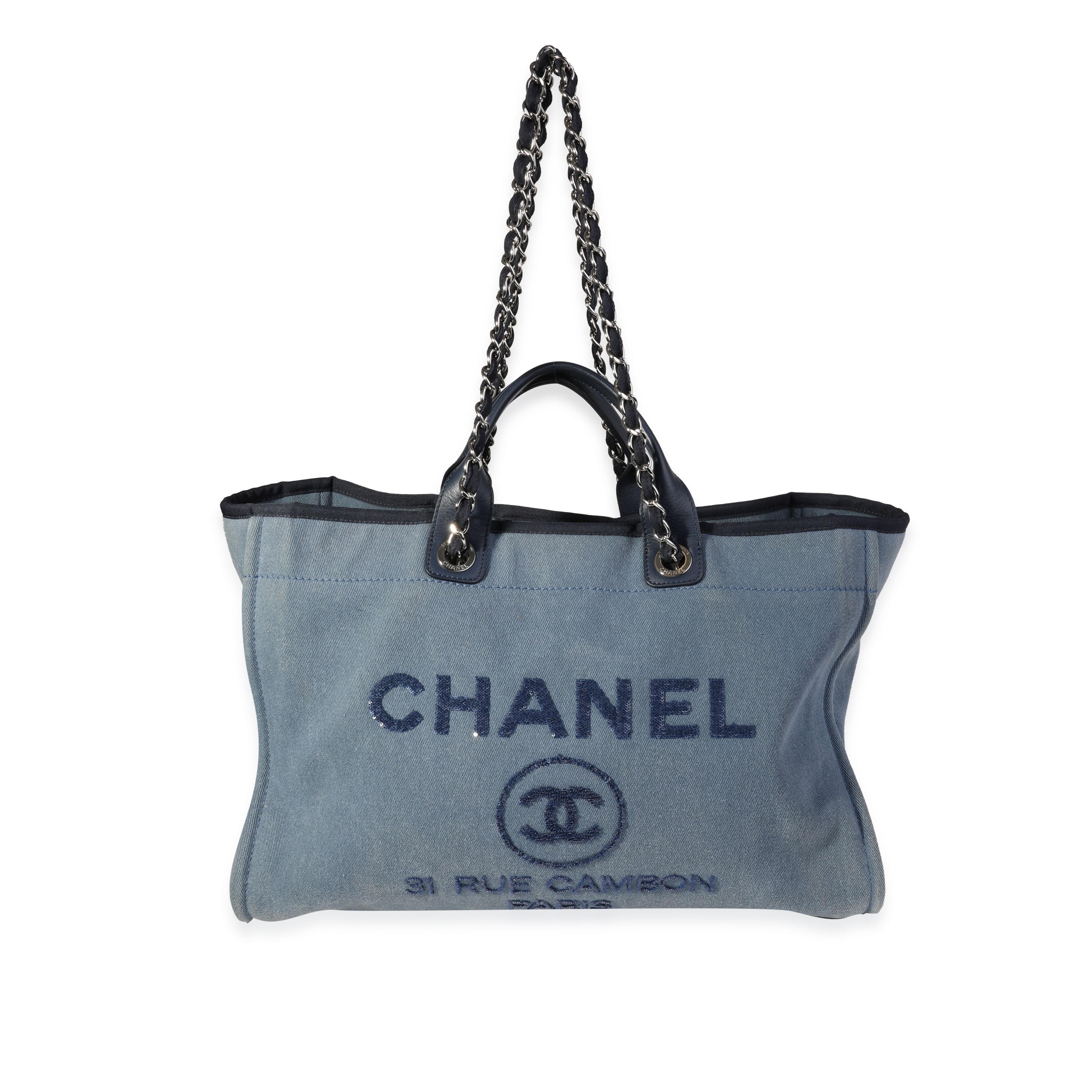 Listing Title: Chanel Blue Canvas & Sequins Large Deauville Tote
SKU: 120932
Condition: Pre-owned (3000)
Handbag Condition: Very Good
Condition Comments: Fading and wear to denim. Interior shows signs of use.
Brand: Chanel
Model: Deauville
Origin