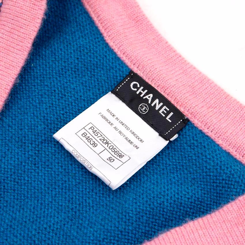 Chanel blue and pink cashmere cardigan. 

Features silver-toned 