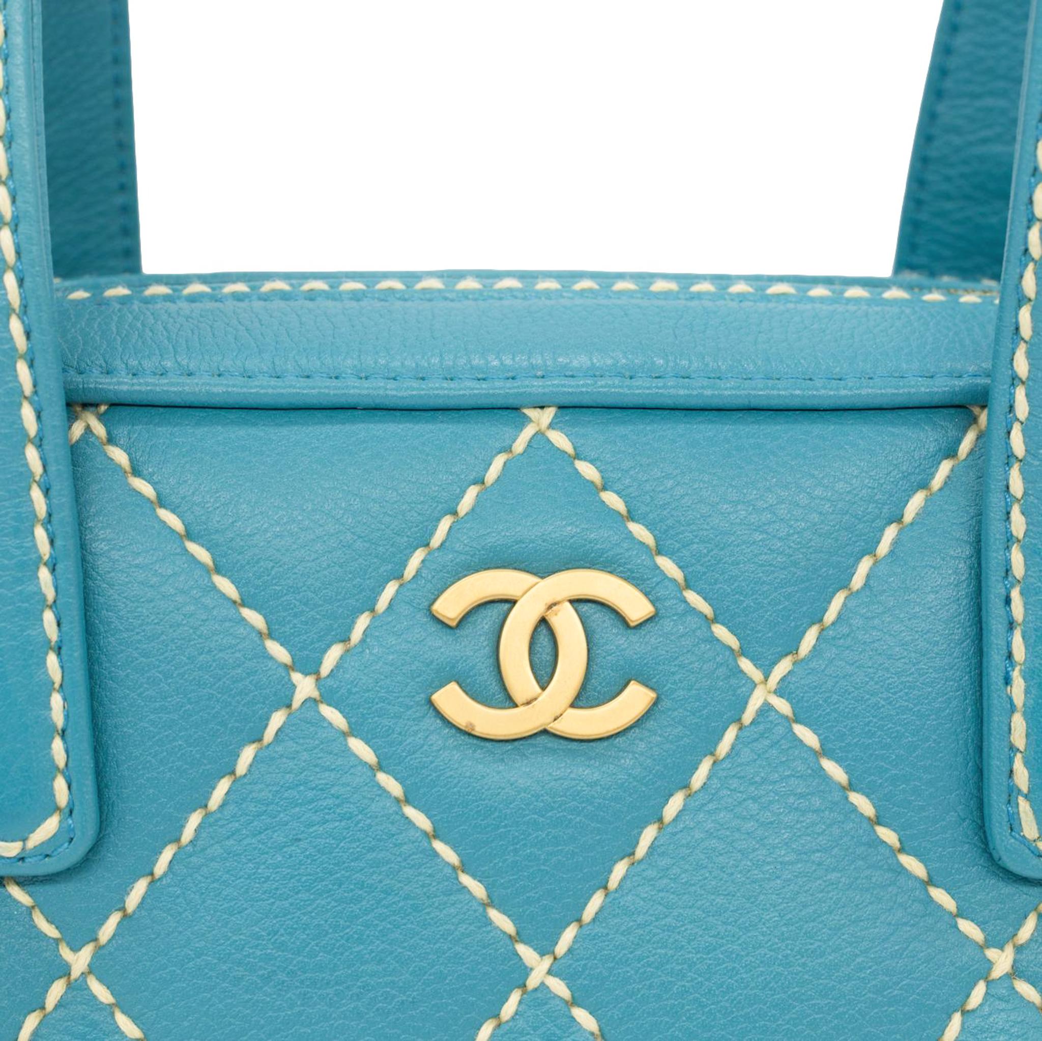 Chanel Blue Caviar Calfskin Leather Wild Stitch Surpique Bowler Top Handle Bag, 2004. This highly coveted and rare collectible surpique bowler was produced between 2003 - 2004, baring a serial code of 