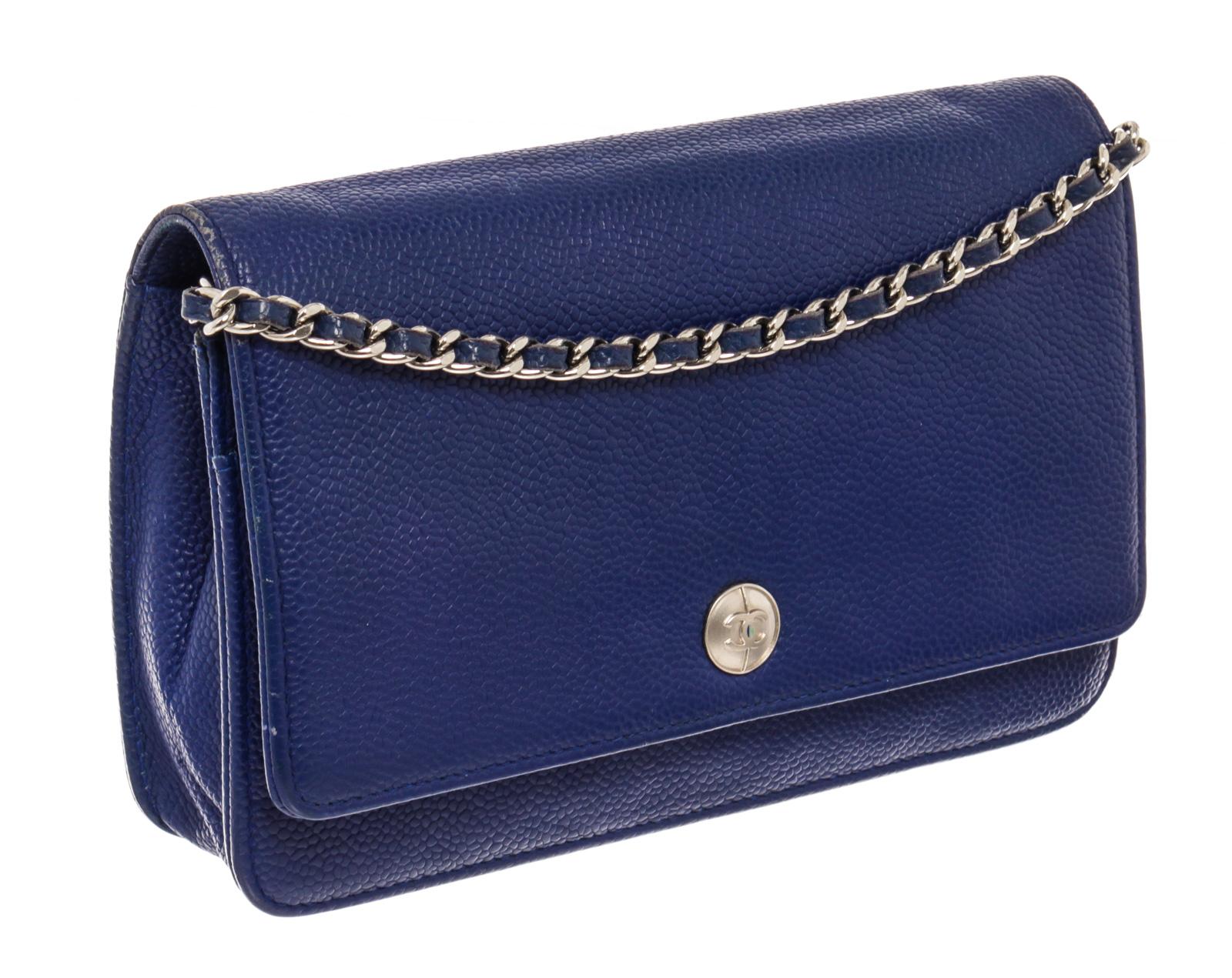 Blue grained Caviar leather Chanel CC Button wallet on chain with silver-tone hardware, a button with interlocking CC logo at the center, front flap with snap closure that will open to aqua green leather-lined interior with one zipped pocket, one