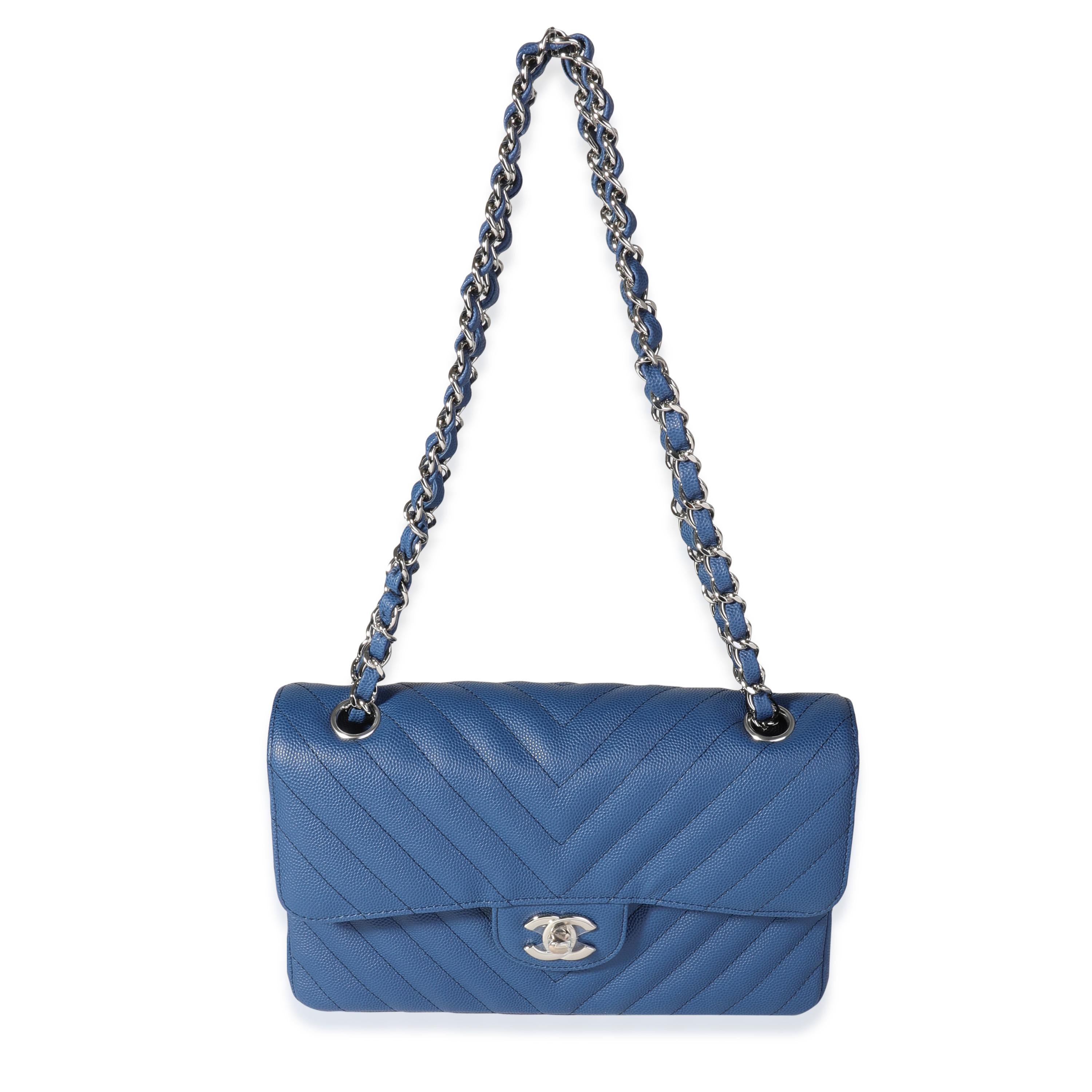 Listing Title: Chanel Blue Caviar Quilted Chevron Small Classic Double Flap Bag
SKU: 117761
MSRP: 8200.00
Condition: Pre-owned (3000)
Handbag Condition: Never Worn
Brand: Chanel
Model: Blue Caviar Chevron Small Double Flap Bag
Origin Country:
