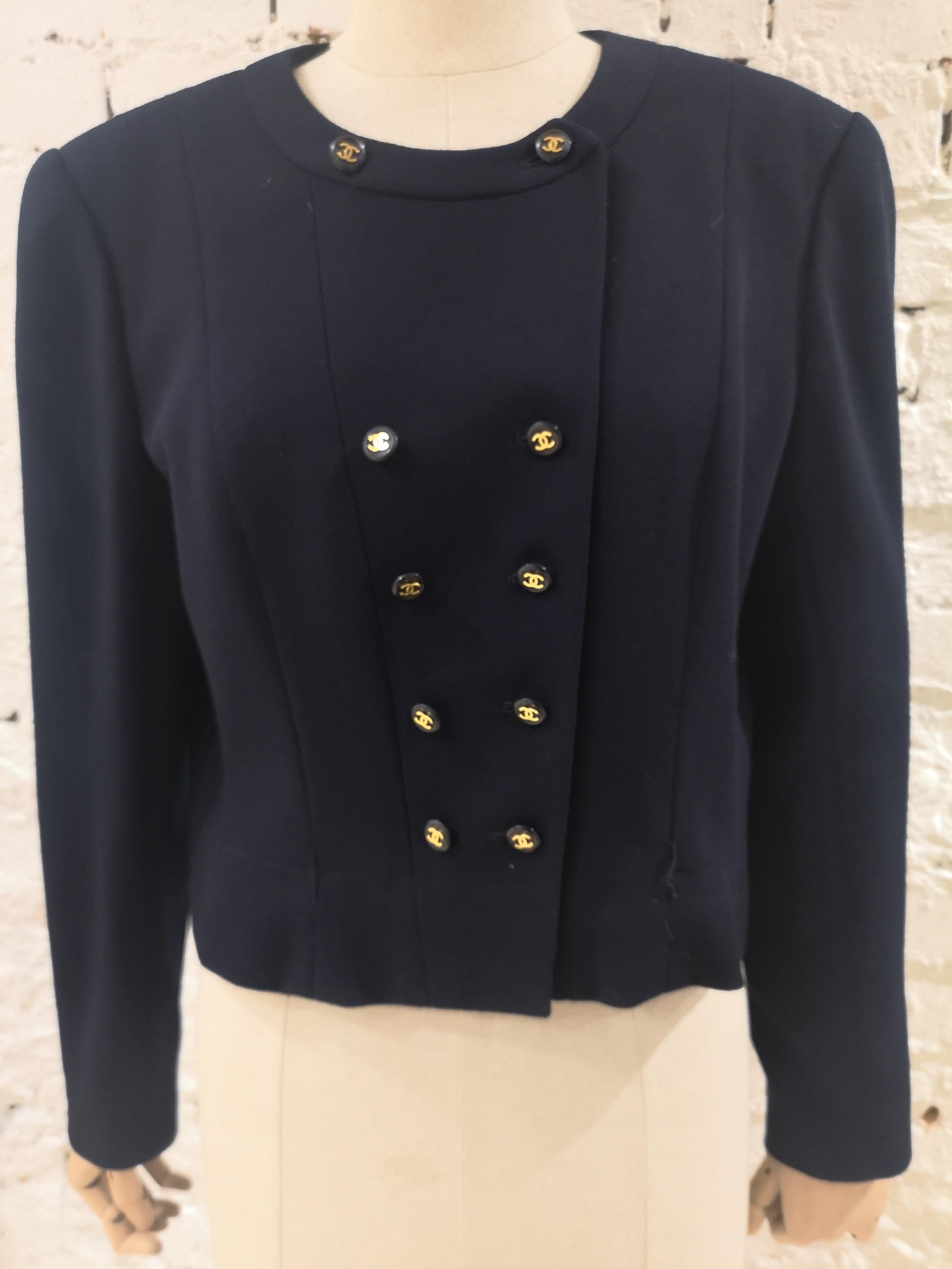 Chanel blue CC logo buttons wool jacket
cc silk lining
totally made in france
embellished with 10 cc logo buttons
size M