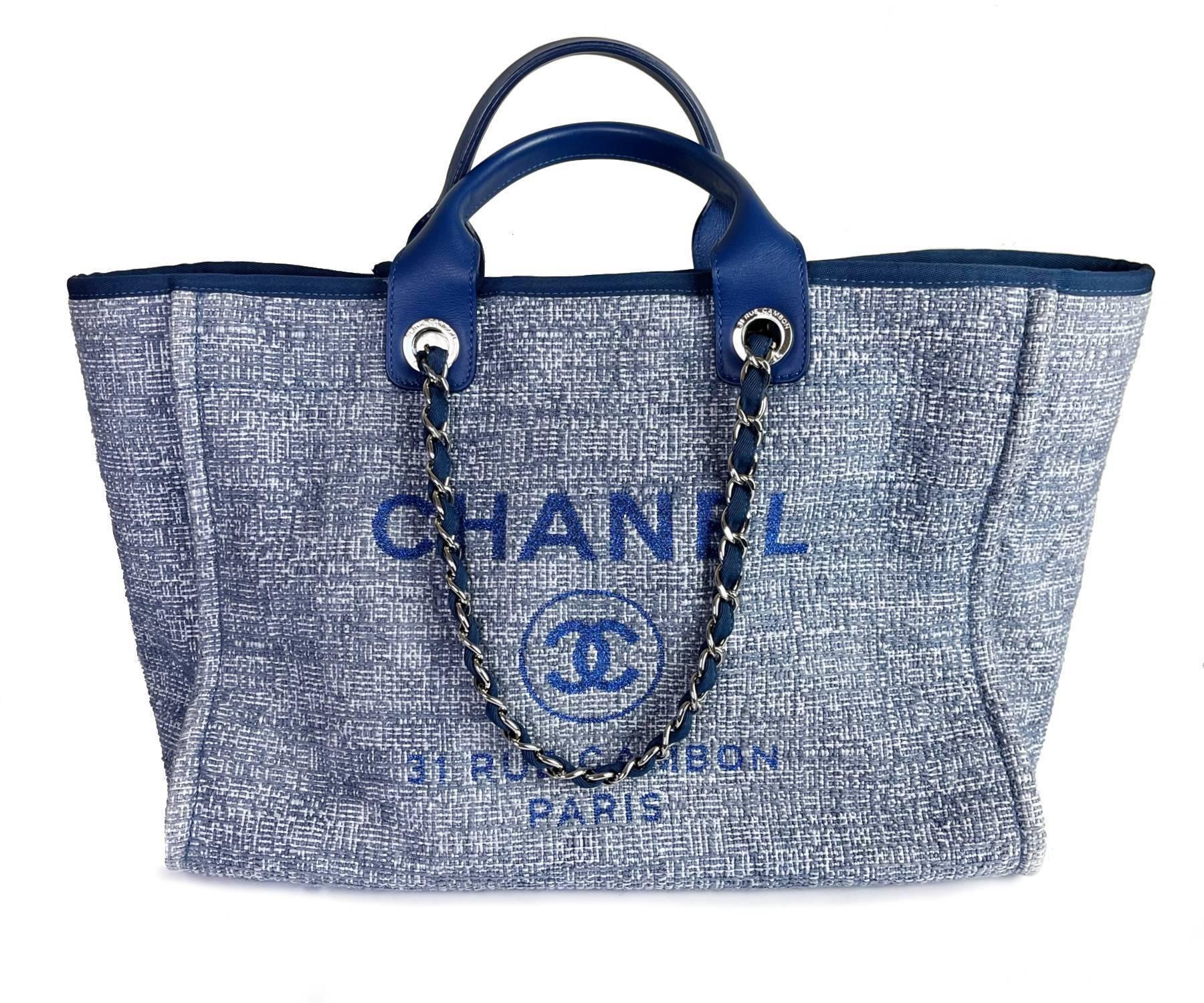 Chanel Blue Cloth Blue Leather Deauville Large Tote Bag

* 2493 xxxx
* Made in Italy
*Comes with the control number card
* As seen on Rihanna and Miranda Kerr

-It is approximately 14.75