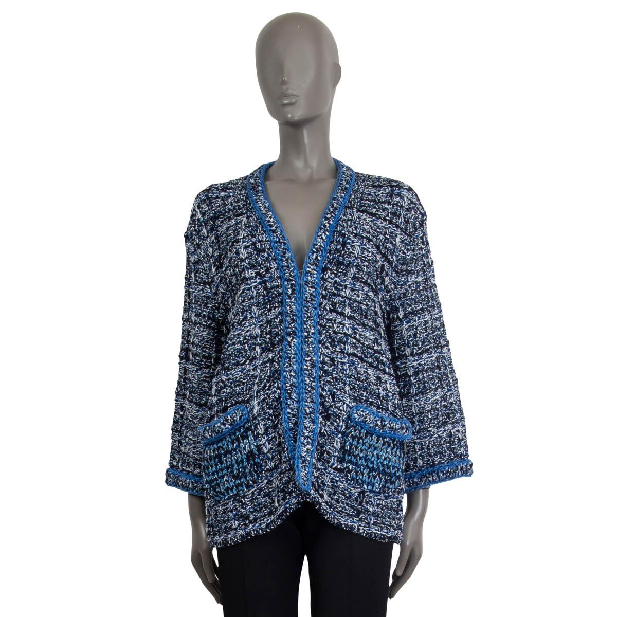 100% authentic Chanel crochet cardigan in blue, black, white and grey cotton (100%). Spring/summer 2017 collection. Embellished with lurex threads and a blue rubber chain on the cuffs, pockets and the collar. Comes with two slit pockets, one with CC