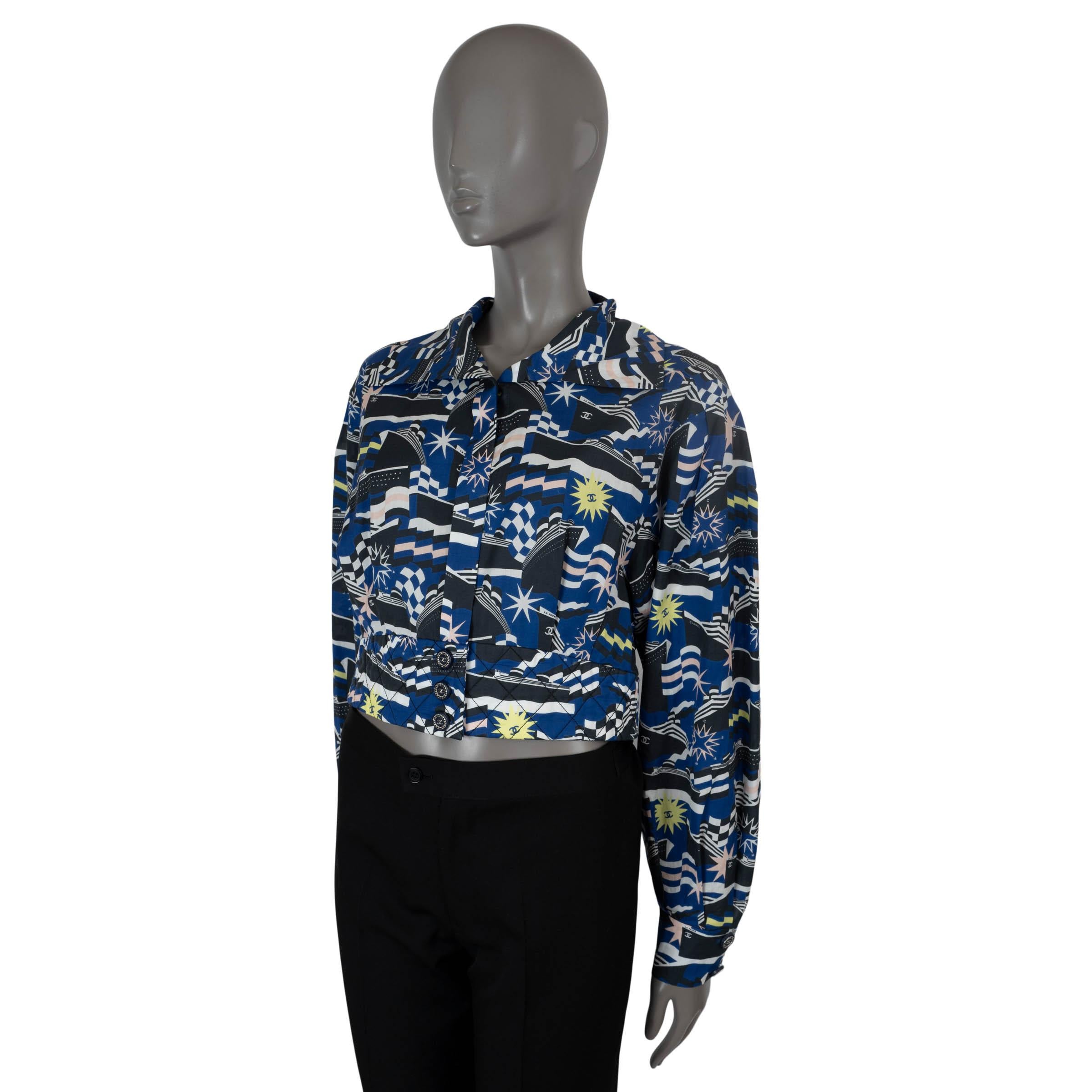 100% authentic Chanel printed blouse in blue, navy, white, yellow and soft pink poplin cotton (100%). Features a cropped silhouette, quilted waist band and buttoned cuffs. Closes with four CC buttons at the waist and is lined in silk (100%). Has