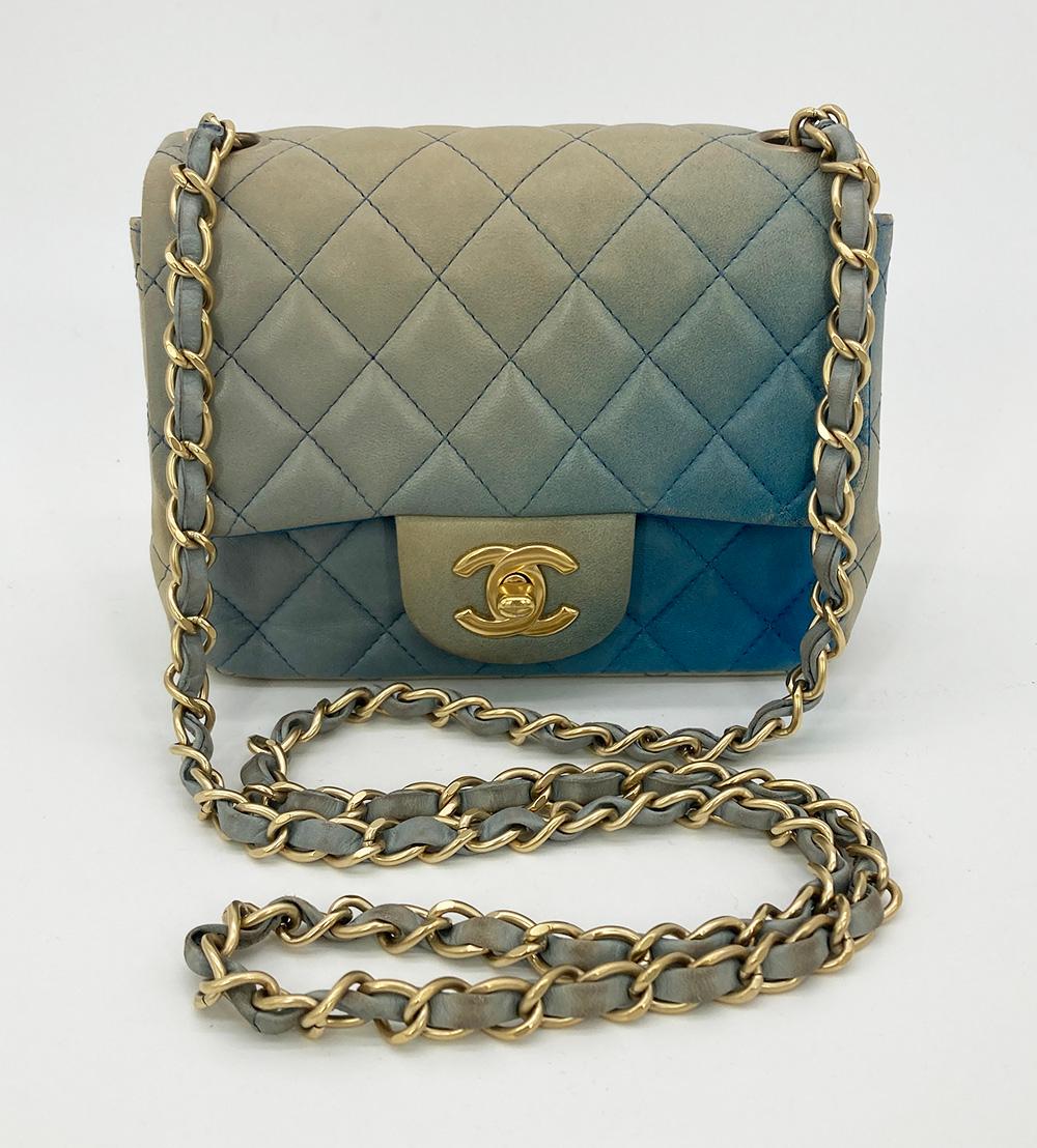 Chanel Blue Degrade Mini Square Classic Flap in fair condition. Blue and beige lambskin in unique and rare degrade ombre pattern trimmed with matte gold hardware. CC Logo twist closure opens via single flap to a blue leather interior with one slit