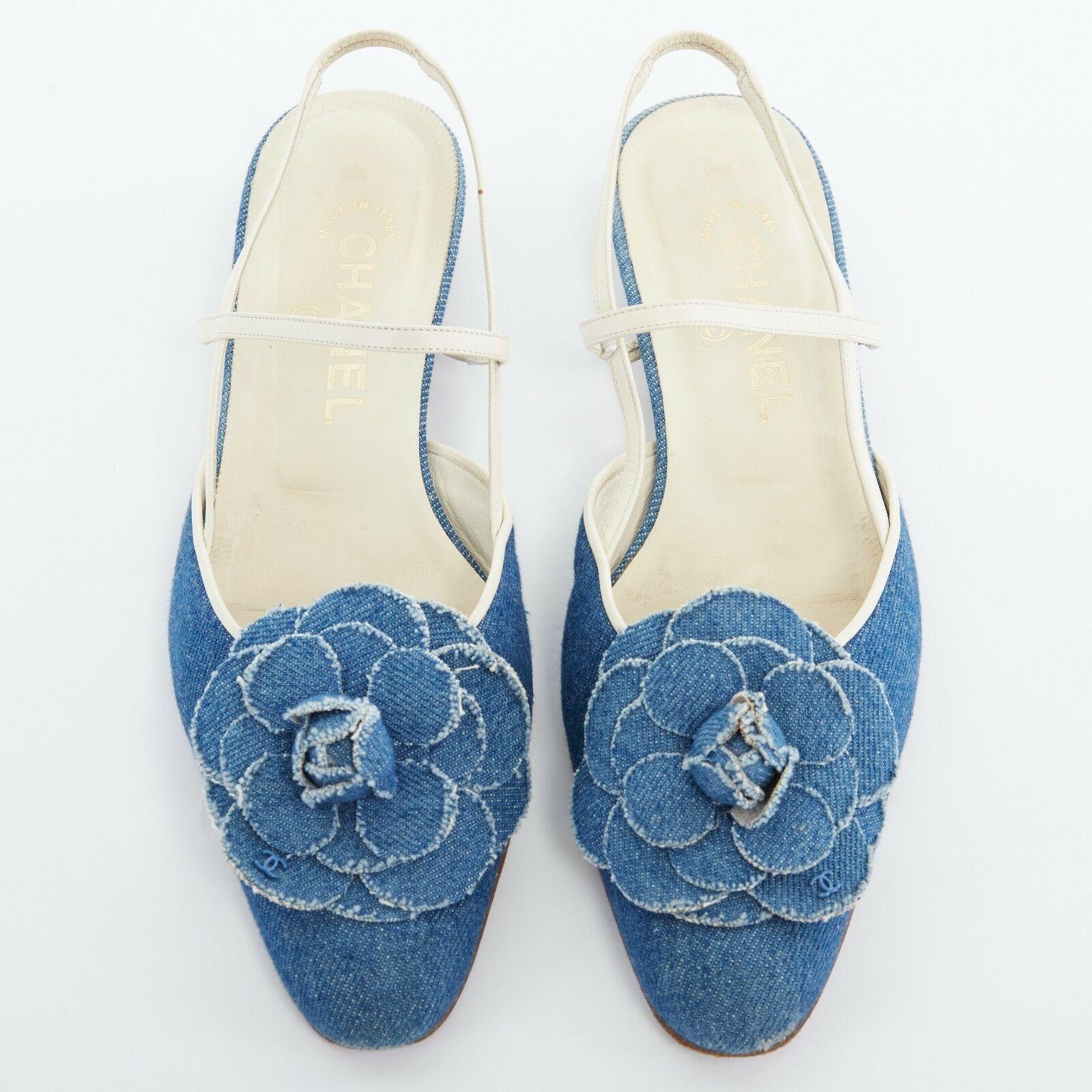 CHANEL blue denim Camellia CC sling back almond toe flats shoe EU37.5 US7.5

CHANEL
Light blue denim upper. Camellia petal flower design at toe. Rounded almond toe. CC logo embellished on a single petal at the toe. Trimmed in cream leather. Strap