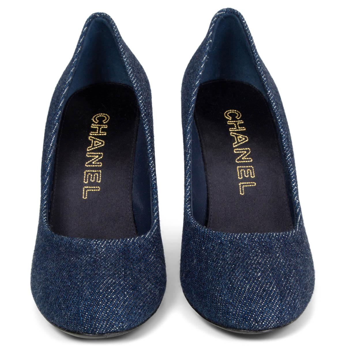 100% authentic Chanel pumps in navy blue denim with a gold-tone metal detail around the heel and a little chain-link CC logo on the side. Have been worn once or twice and are in excellent condition. Come with dust bag. 

Measurements
Imprinted